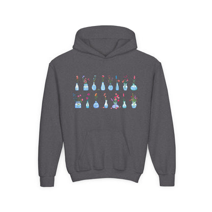 Youth Heavy Blend Hooded Sweatshirt - Set of flower vase Printify