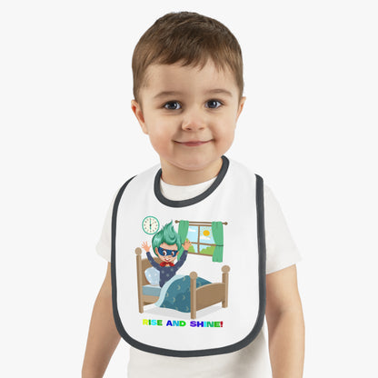 Baby Bib - Super kiddo teaches us to wake up early - [[{"value":"Wonderwear Kid"}]]
