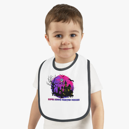 Baby Bib - Super kiddo flying on hunted house - [[{"value":"Wonderwear Kid"}]]