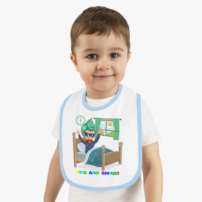 Baby Bib - Super kiddo teaches us to wake up early - [[{"value":"Wonderwear Kid"}]]