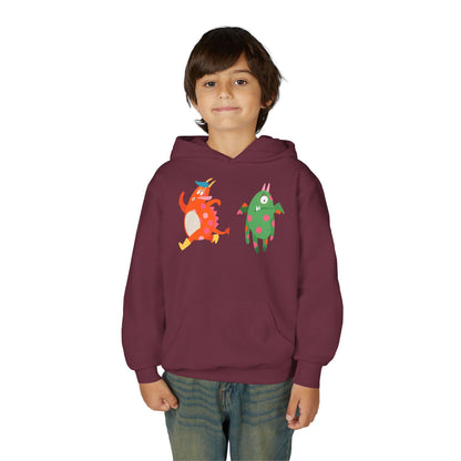 Youth Heavy Blend Hooded Sweatshirt - Monsters in action Printify