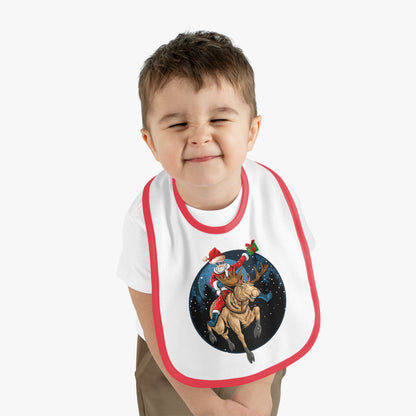 Baby Bib - Super kiddo riding a reindeer - [[{"value":"Wonderwear Kid"}]]