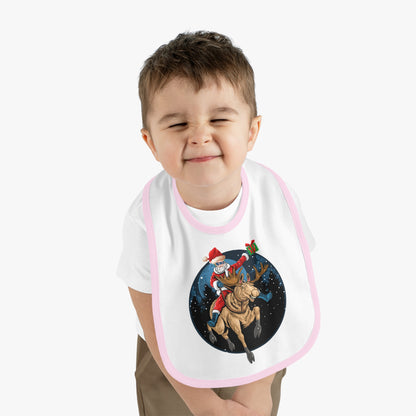 Baby Bib - Super kiddo riding a reindeer - [[{"value":"Wonderwear Kid"}]]